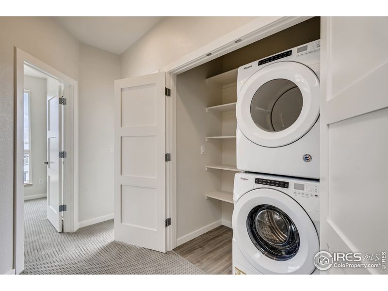 Photos are of a similar unit - washer and dryer not included