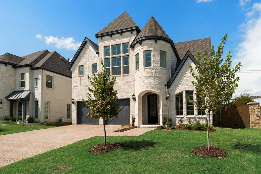 Representative exterior photo of a completed home built from the Grand Martinique by Grand Homes in Grand Oaks, Celina, TX (Image 19). Representative exterior photo of a completed home built from the Grand Martinique by Grand Homes in Grand Oaks, Celina, TX (Image 19).