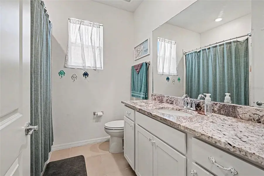 Furnished interior view inside a new home in Woodcreek, Wesley Chapel (Image 7).