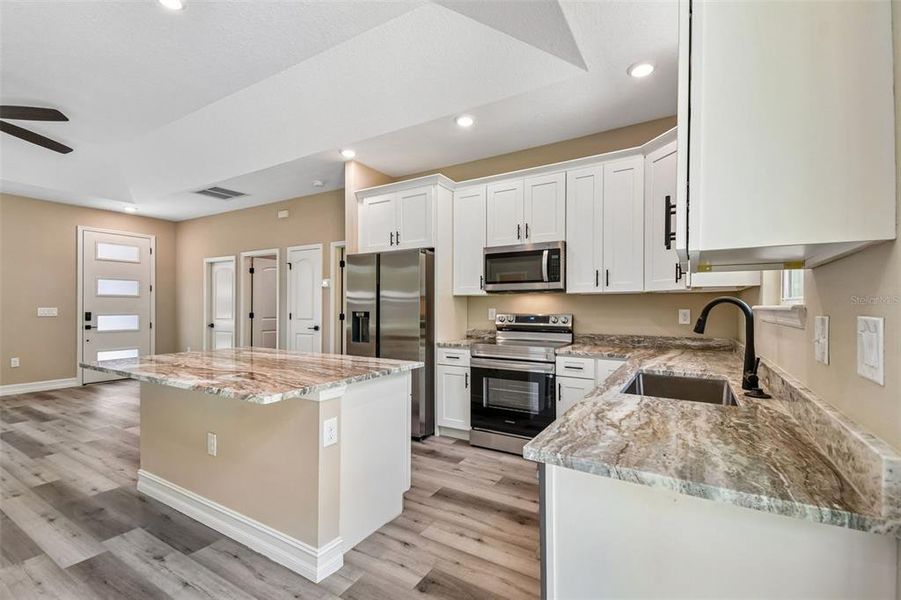 Furnished interior view inside a new home in , Deland (Image 8).