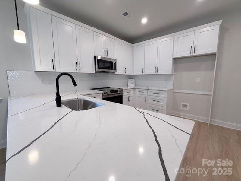 Furnished interior view inside a new home in , Gastonia (Image 25).