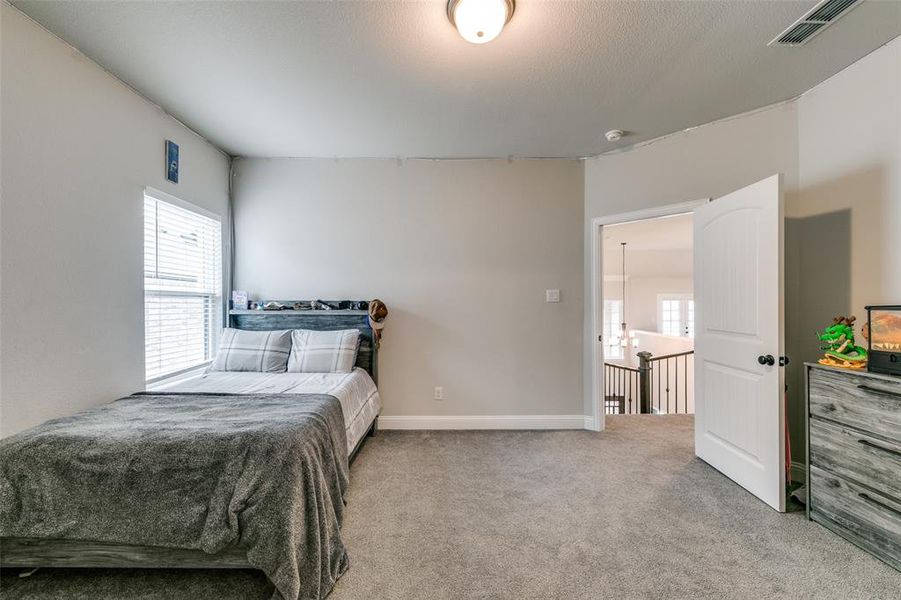 Upstairs Bedroom with carpet