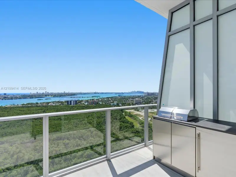 Exterior details and patio area of a home in , North Miami (Image 26).