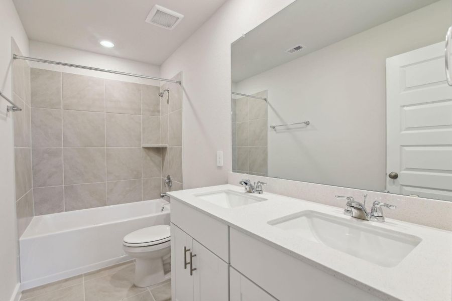 Furnished interior view inside a new home in Landing Meadows - Premier Series, New Caney (Image 10).