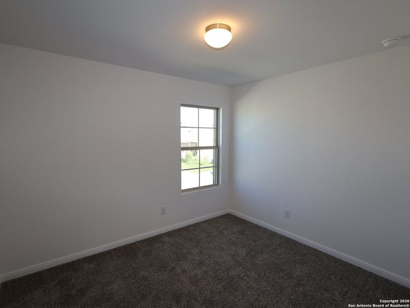 Spacious, unfurnished interior of a new home in Hunters Ranch, San Antonio (Image 18).