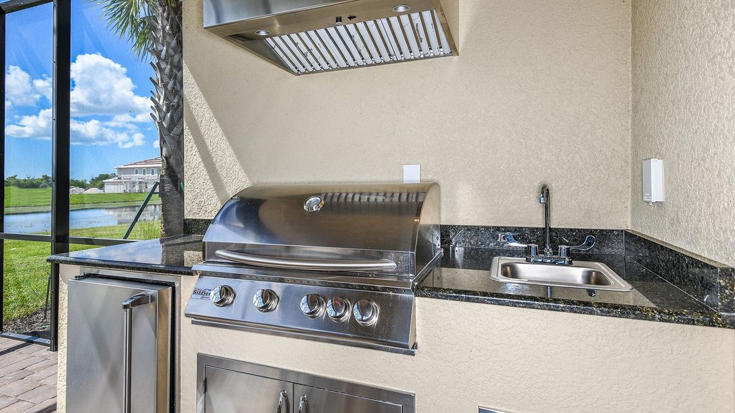Representative furnished interior of a home built from the Ceretti by Taylor Morrison in Esplanade by the Islands, Naples (Image 25).