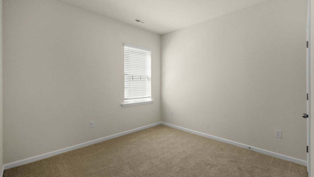 Spacious, unfurnished interior of a new home in The Grove at Matthews Landing, Fuquay Varina (Image 15).