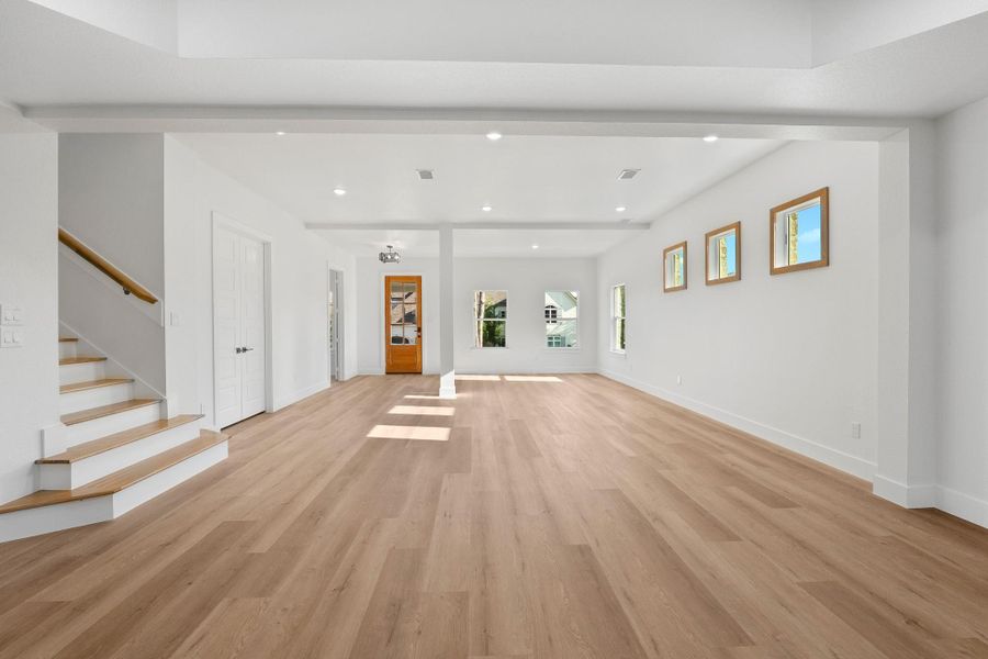 Bright natural blonde vinyl flooring beautifully enhanced by abundant natural light. Bright natural blonde vinyl flooring beautifully enhanced by abundant natural light.