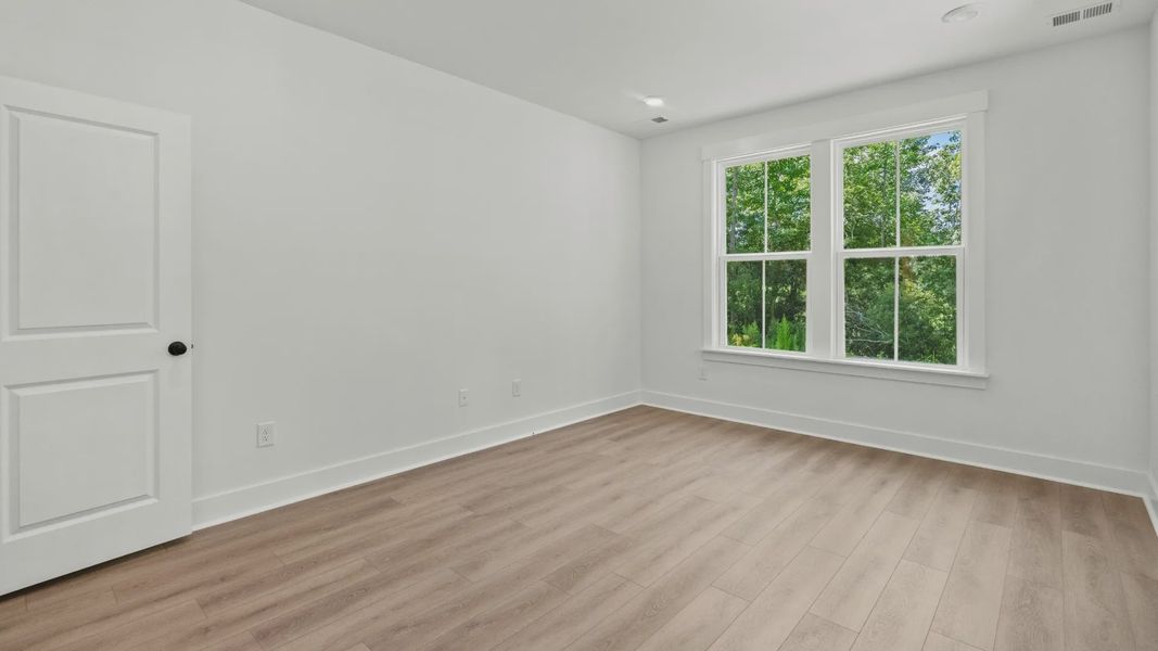 Furnished interior view inside a new home in Bluffs at Sun Colony, Longs (Image 15).