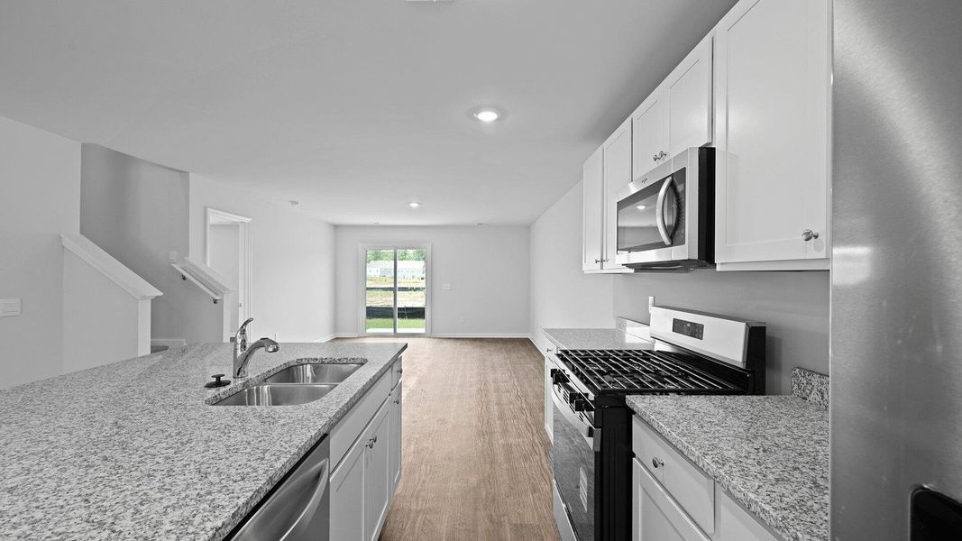Furnished interior view inside a new home in Pine Hills Townhomes at Cane Bay, Summerville (Image 10). Furnished interior view inside a new home in Pine Hills Townhomes at Cane Bay, Summerville (Image 10).