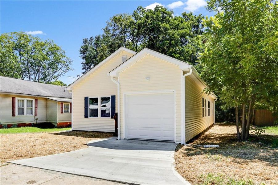 Front exterior of a new home in , Cedartown, GA, highlighting curb appeal (Image 16).