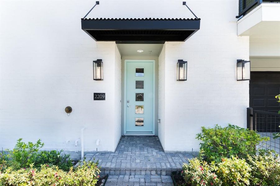 Front entrance creates the feeling of having traveled to faraway places.