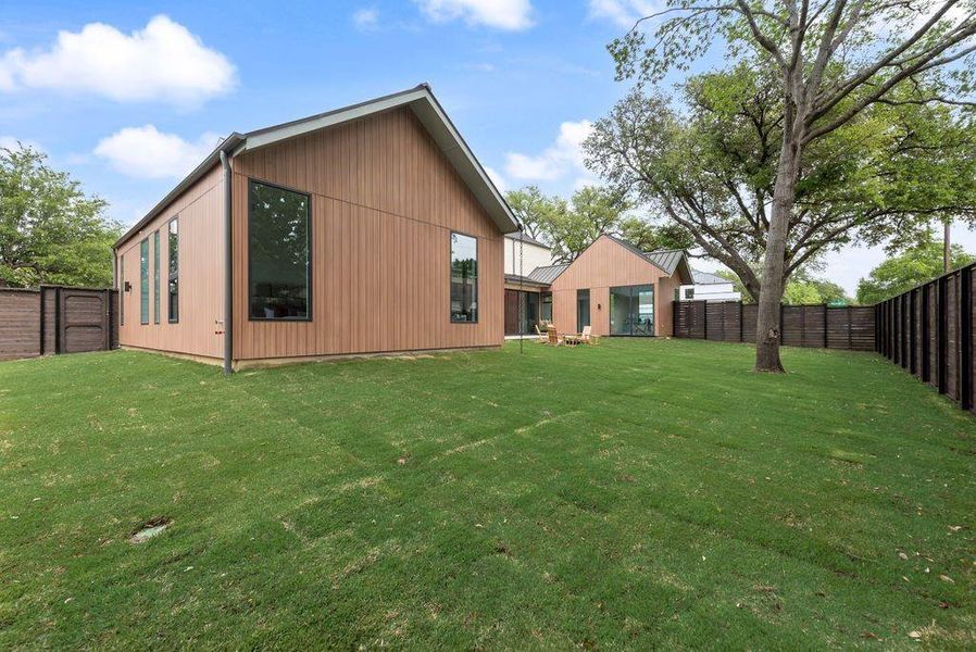 Fully fenced oversized yard offering privacy and room to entertain.