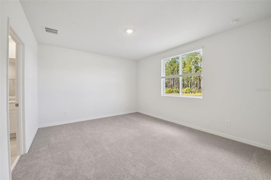 Spacious, unfurnished interior of a new home in Ridgehaven - Villas, Ormond Beach (Image 20).