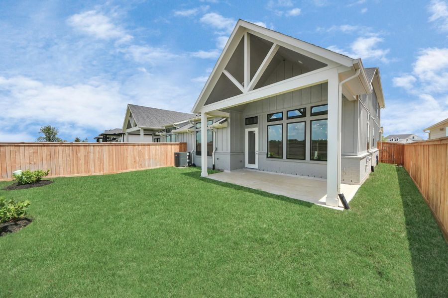 Front exterior of a new home in Bridgeland: Signature Collection, Cypress, TX, highlighting curb appeal (Image 16).