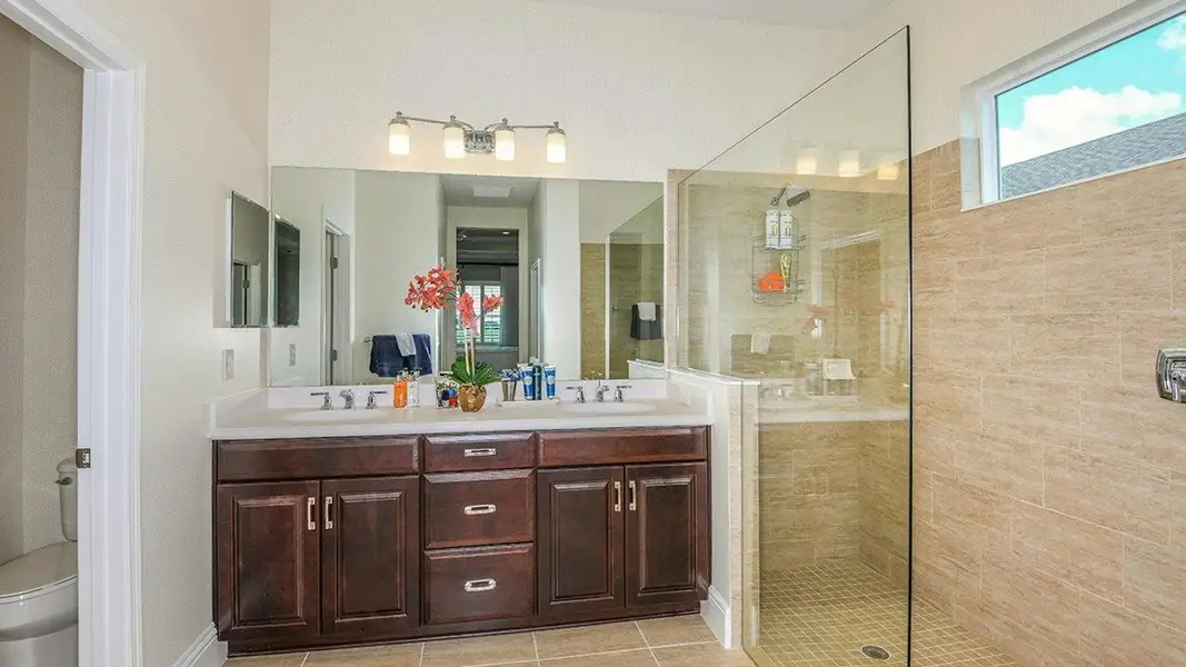 Furnished interior view inside a new home in Canoe Creek Real Estate and Homes for Sale in Parrish, FL - Neal Communities, Parrish (Image 30).