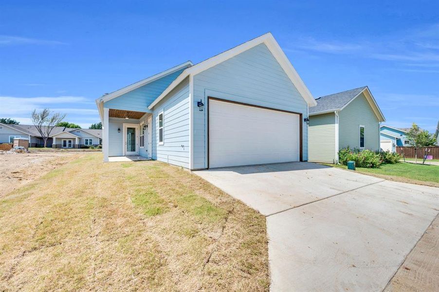 Front exterior of a new home in , Midlothian, TX, highlighting curb appeal (Image 20).