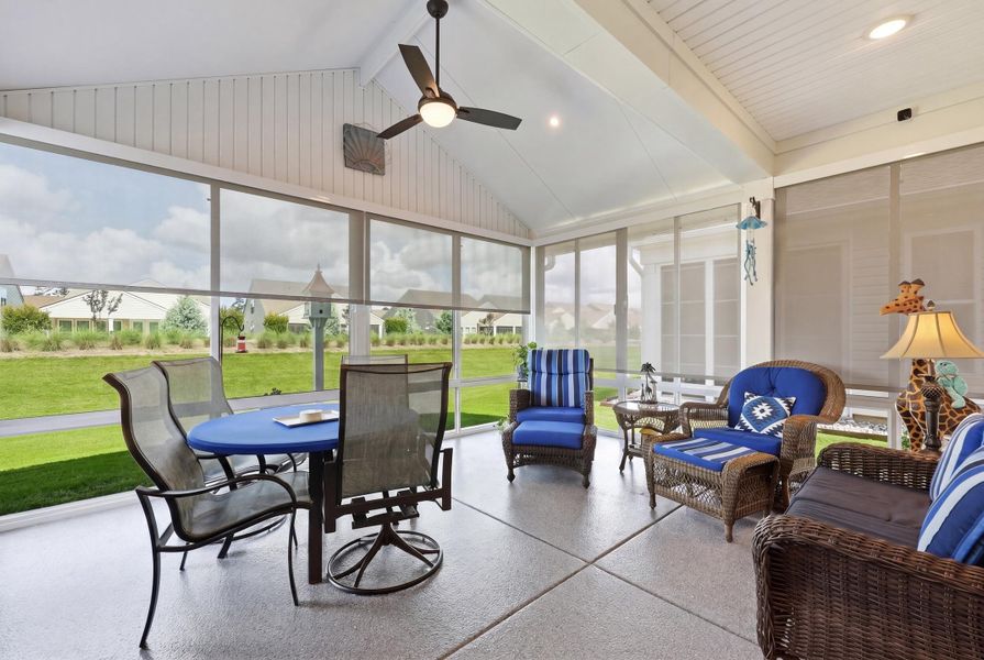 Exterior details and patio area of a home in K. Hovnanian's® Four Seasons at Lakes of Cane Bay, Summerville (Image 22).