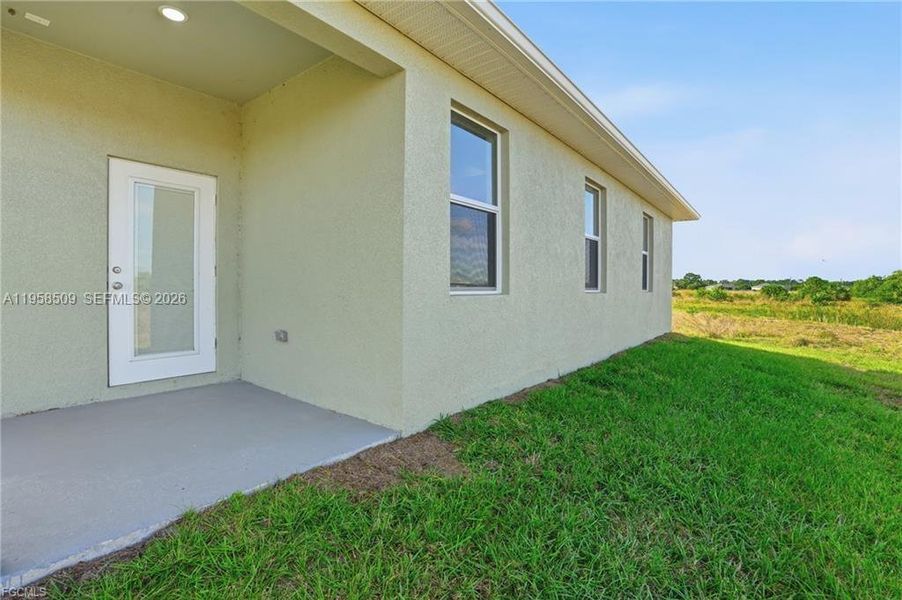 Exterior details and patio area of a home in , Labelle (Image 22).