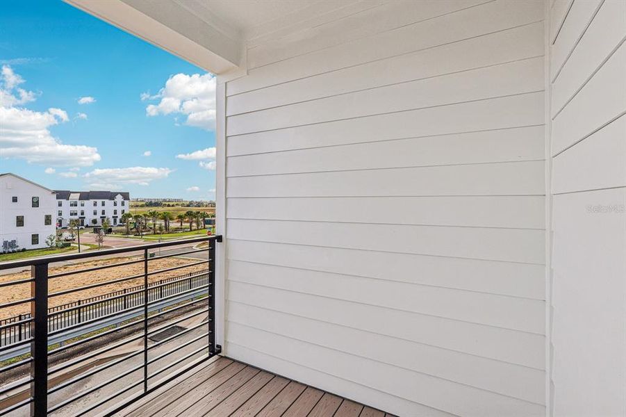 Exterior details and patio area of a home in Parkview at Hamlin, Winter Garden (Image 14).