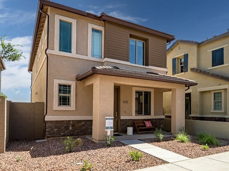 Front exterior of a new home in Ironwood Villages at North Creek, Queen Creek, AZ, highlighting curb appeal (Image 23).