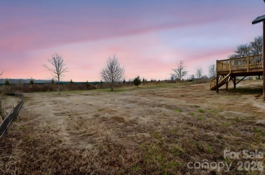 large rear yard with abundance of sunlight makes for a great space for gardening, entertaining or creating your own haven