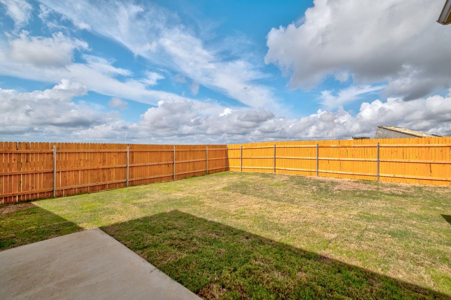 Exterior details and patio area of a home in Trinity Ranch, Elgin (Image 2). Exterior details and patio area of a home in Trinity Ranch, Elgin (Image 2).