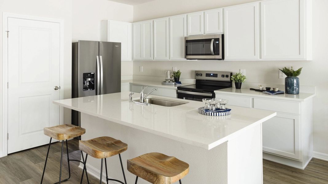 Furnished interior view inside a new home in Oasis at Longwood Run, Sarasota (Image 8).