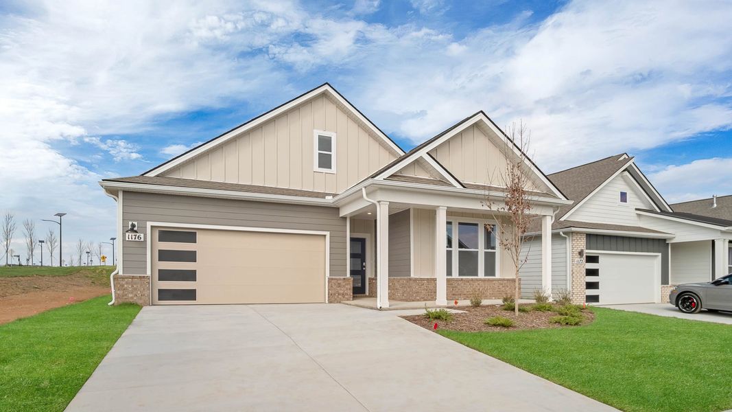 Front exterior of a new home in Nexus South, Gallatin, TN, highlighting curb appeal (Image 1).