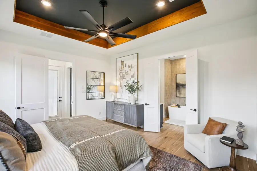 Furnished interior view inside a new home in Bridgeland, Cypress (Image 14).