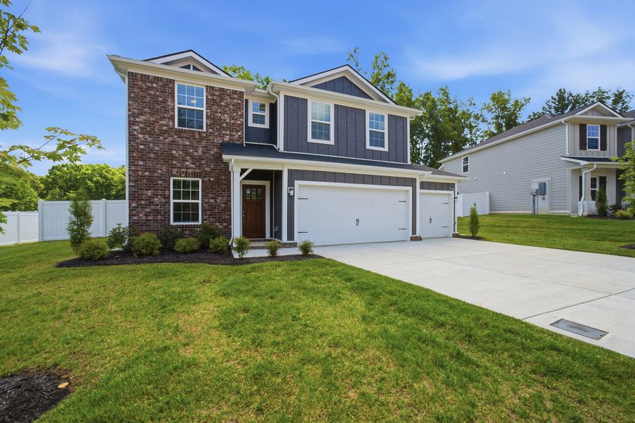 Front exterior of a new home in Brush Creek, Fairview, TN, highlighting curb appeal (Image 2). Front exterior of a new home in Brush Creek, Fairview, TN, highlighting curb appeal (Image 2).
