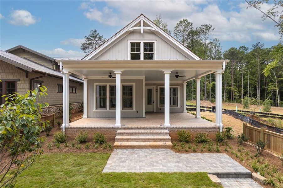 Front exterior of a new home in , Chattahoochee Hills, GA, highlighting curb appeal (Image 20). Front exterior of a new home in , Chattahoochee Hills, GA, highlighting curb appeal (Image 20).