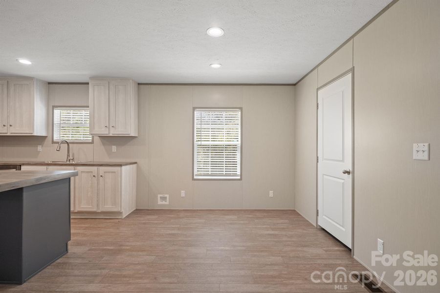 Spacious, unfurnished interior of a new home in , Old Fort (Image 9).