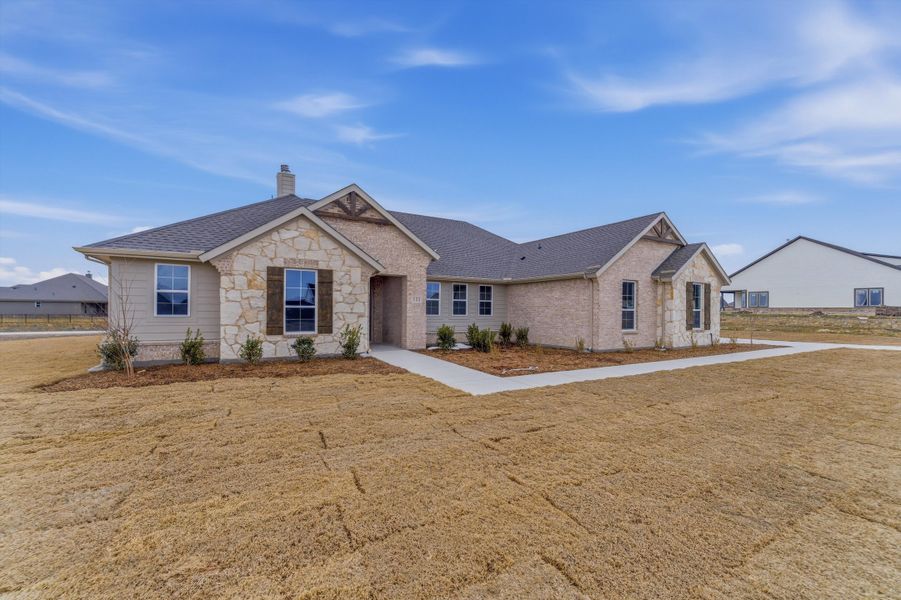 Front exterior of a new home in Fairview Meadows, New Fairview, TX, highlighting curb appeal (Image 14).