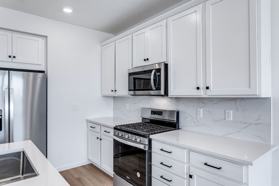Furnished interior view inside a new home in Westside Crossing Townhomes, Berthoud (Image 3).