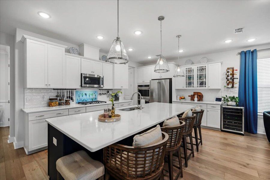 Furnished interior view inside a new home in K. Hovnanian's® Four Seasons at Lakes of Cane Bay, Summerville (Image 13).