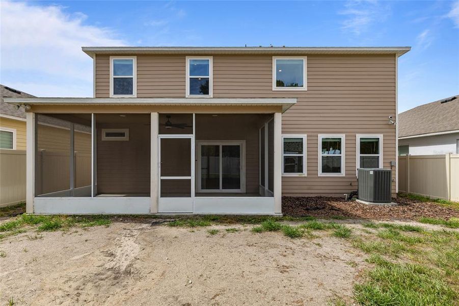Exterior details and patio area of a home in Avalon Woods, Newberry (Image 26).