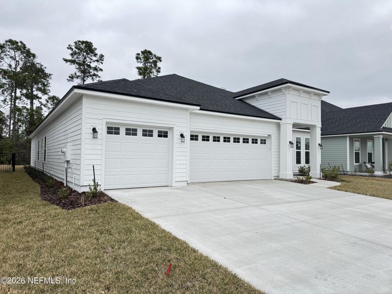 Front exterior of a new home in Hyland Trail, Green Cove Springs, FL, highlighting curb appeal (Image 24).