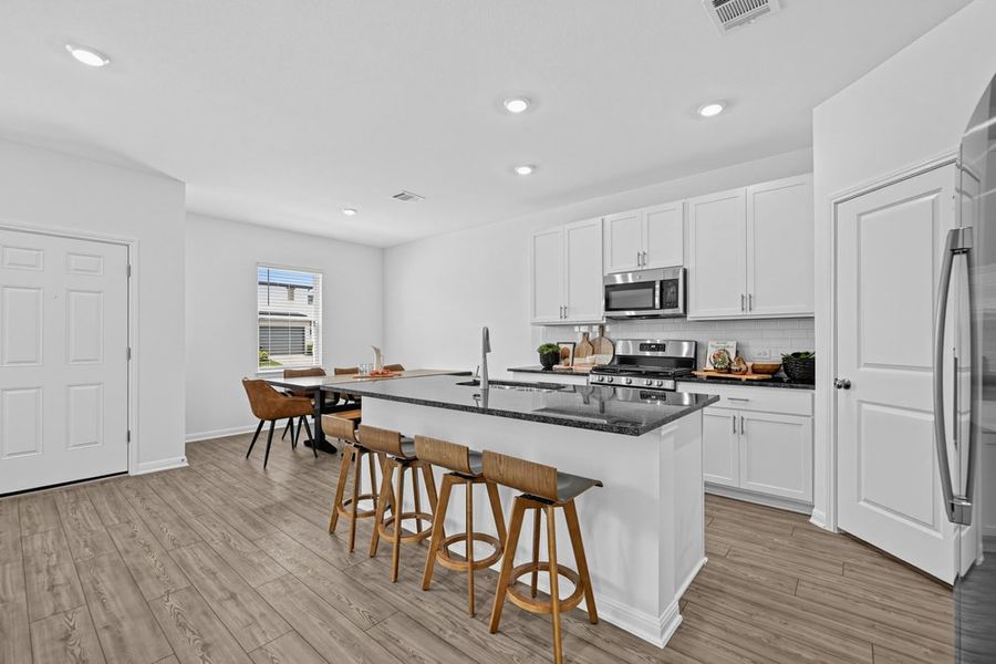 Representative furnished interior of a home built from the Grouse by Taylor Morrison in Emory Crossing, Hutto (Image 4).