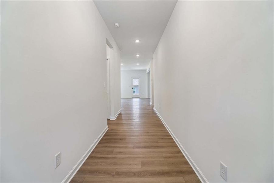 Spacious, unfurnished interior of a new home in Eastlyn Crossing, Flowery Branch (Image 18).