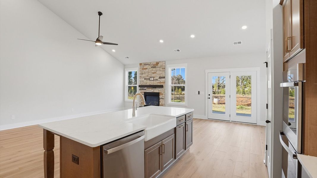 Well-designed kitchen with a center island and tasteful finishes that elevate everyday living at Pelham Crossing