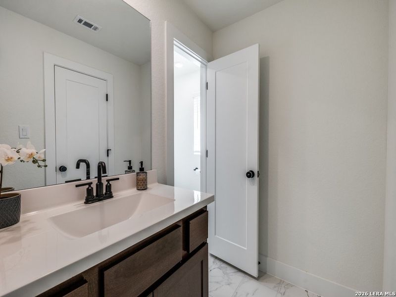 Furnished interior view inside a new home in The Ranches at Creekside, Boerne (Image 18).