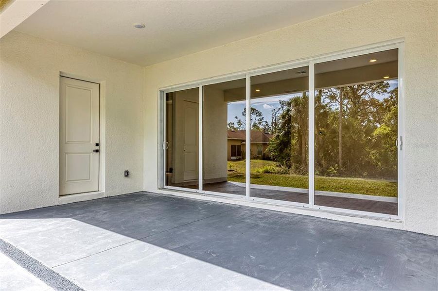 Exterior details and patio area of a home in , Port Charlotte (Image 24).