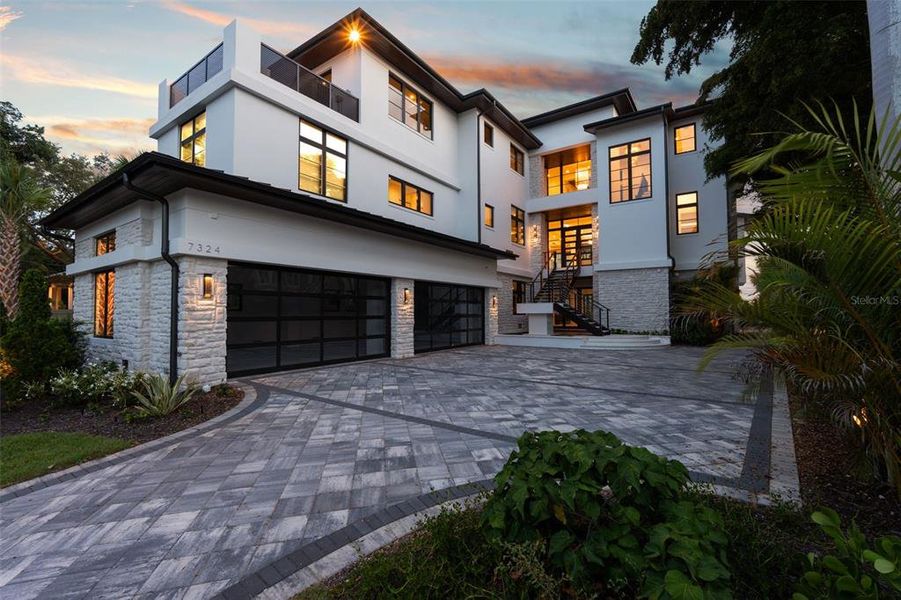 Front exterior of a new home in , Sarasota, FL, highlighting curb appeal (Image 23). Front exterior of a new home in , Sarasota, FL, highlighting curb appeal (Image 23).
