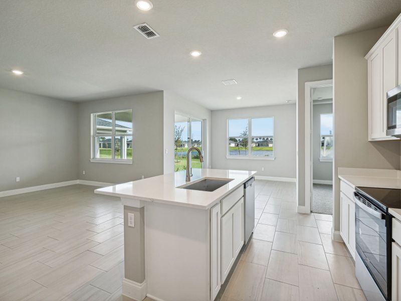 Kitchen in the Bergamo floorplan at 8984 Dahlia Circle