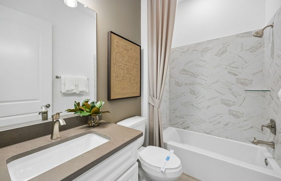 Representative furnished interior of a home built from the Stellar by Del Webb in Del Webb Sugar Land at Ryehill, Rosenberg (Image 11).