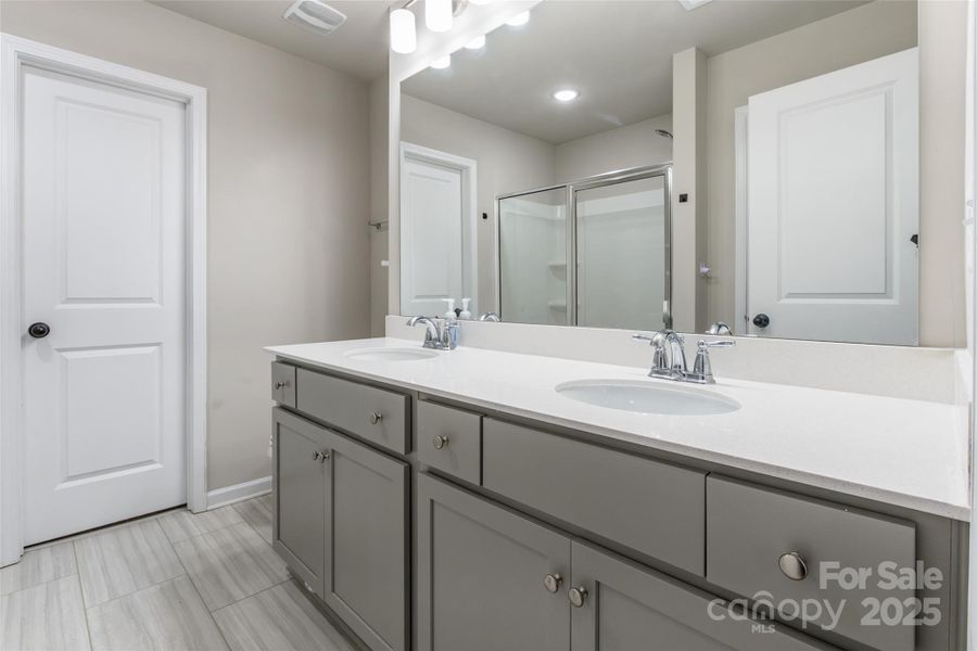 Furnished interior view inside a new home in McGee Place, Charlotte (Image 13).
