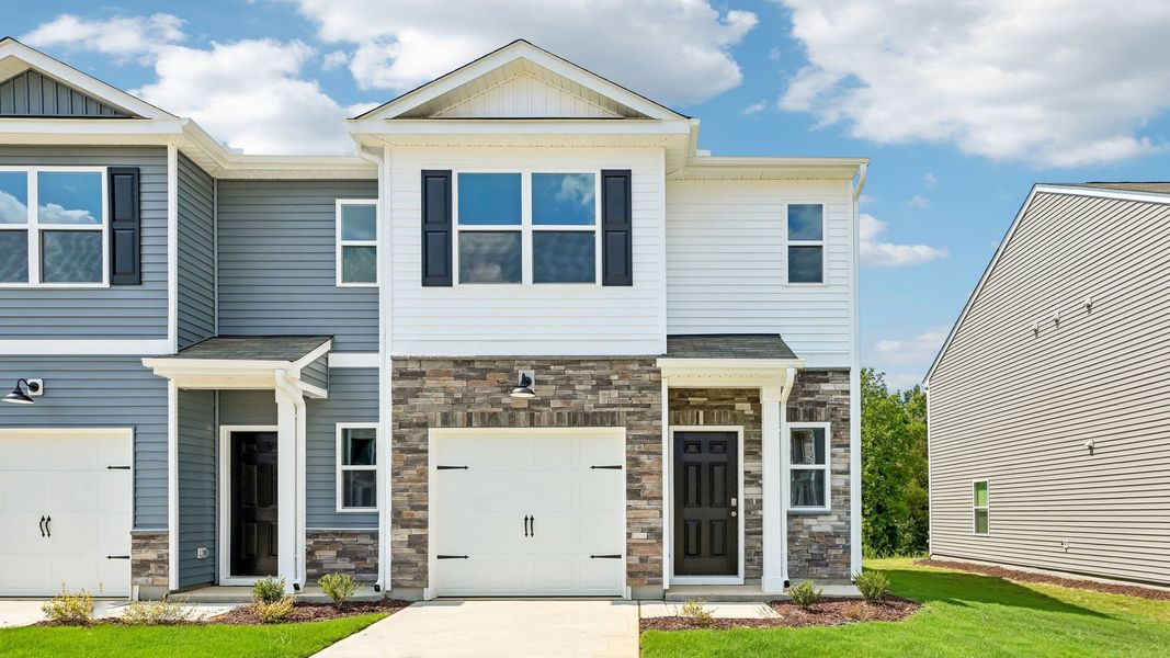 Representative exterior photo of a completed home built from the Payton by D.R. Horton in The Townes at Laurel Oaks, Sanford, NC (Image 15).