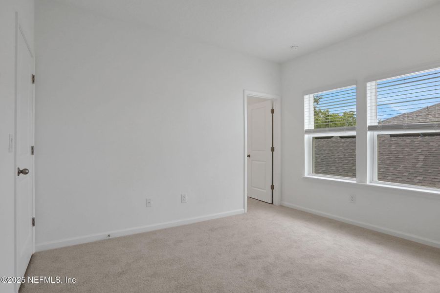 Spacious, unfurnished interior of a new home in TrailMark, St. Augustine (Image 19). Spacious, unfurnished interior of a new home in TrailMark, St. Augustine (Image 19).