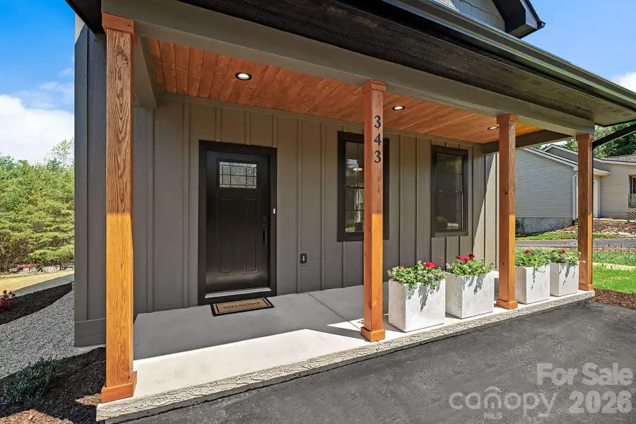 Exterior details and patio area of a home in , Asheville (Image 27).